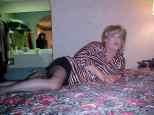 Cat laying on the bed