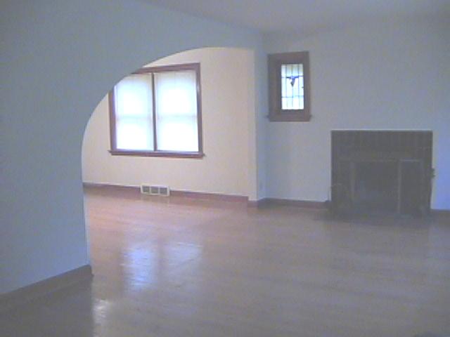 arch.jpg view of details standing at front door facing into living and dining rooms