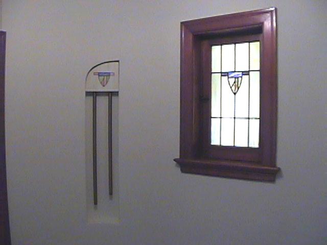 chime.jpg detail of stained glass and door bell near front door