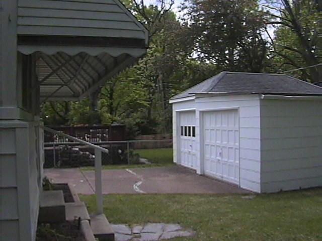 garage.JPG the garage as seen from near corner of enclosed porch