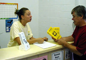Michelle giving out Dog Dayz Info
