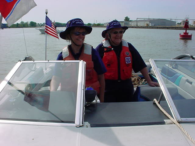 Photo of Auxiliarist at the helm