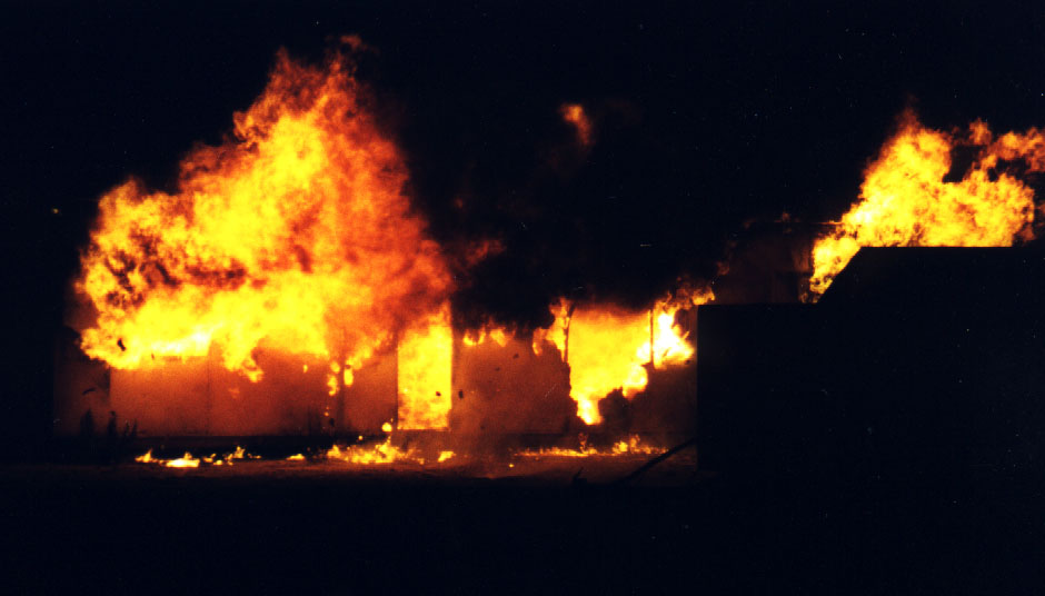 Caravan on fire, at a fire drill