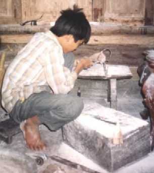 �l�ve au travail (art Vietnamienne)