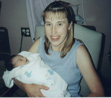 Angie holding Joshua when he was only one day old