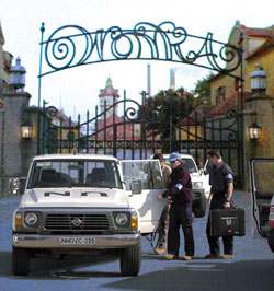 Above: U.N. inspectors arrive at the gates of the Wonka compound.