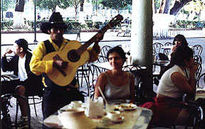 /At the z�calo listening to 'Cafe Caliente's' music.