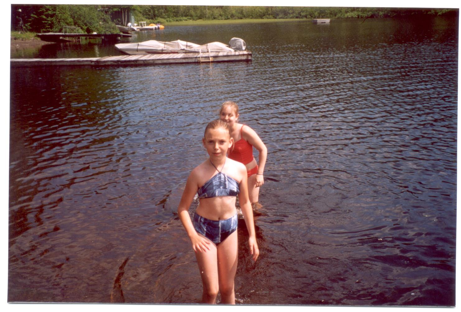 Our grandaughters Ainsley and Alyssa (back) at Suprise Lake July 2003
