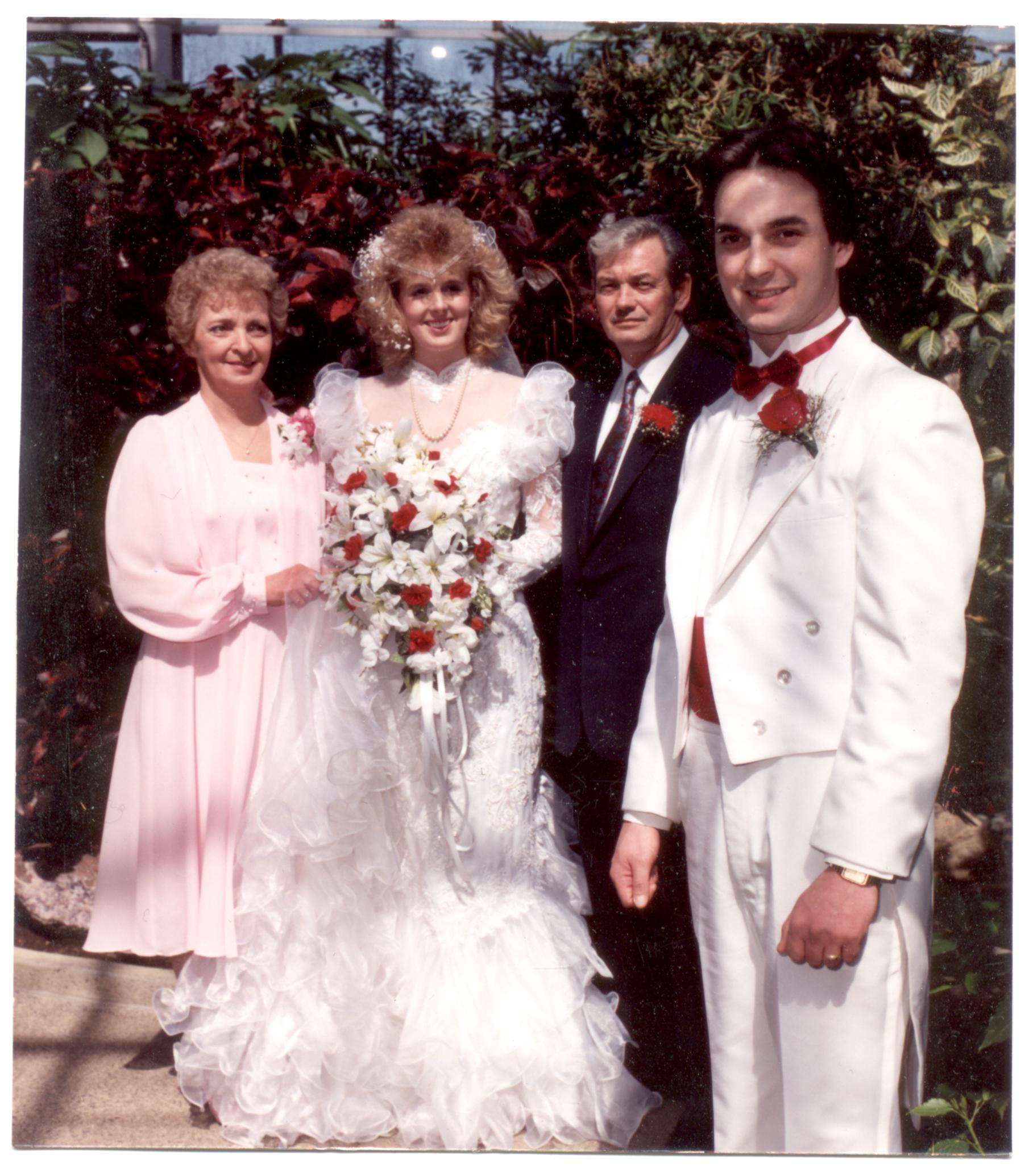 Karen and Steve's wedding April 15,1989, with Millie and I in the background.The photograph was taken in the beautiful Thunder Bay Conservatory