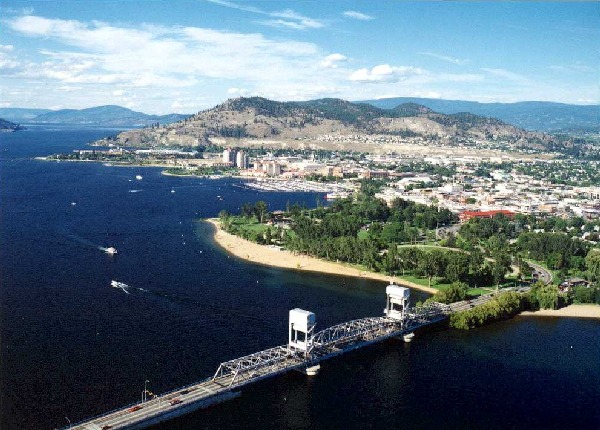 Kelowna from the air, showing the floating bridge. Downtown Kelowna is in the background.