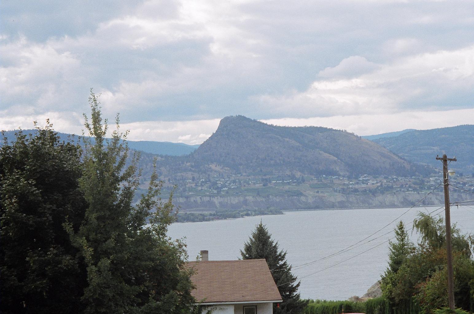 Looking across Okanagan Lake from Naramata. Giants head park mountain,in Summerland is seen across the lake,Sep.2005.