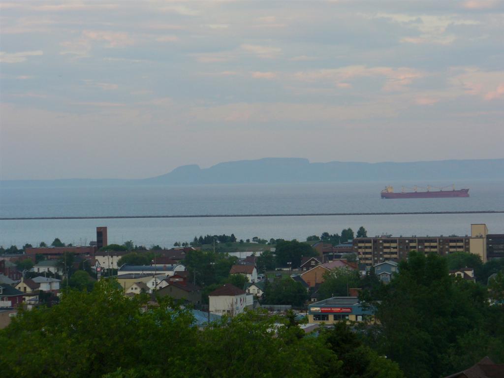 view from Hillcrest park looking towards downtown north ward and harbour with Sleeping Giant in background.Note the saltie (ocean vessel in the harbour)