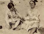 Kate and Jane holding Edith at Hampton Beach