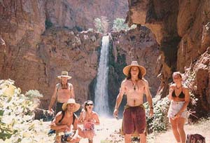 A group of tourists pauses for a photo oportunity just past Mooney Falls.