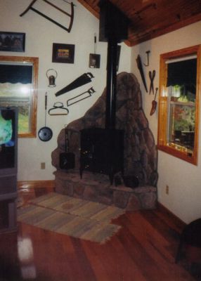I stood on this hearth to get a picture of the stairs, which are on the left by the window.