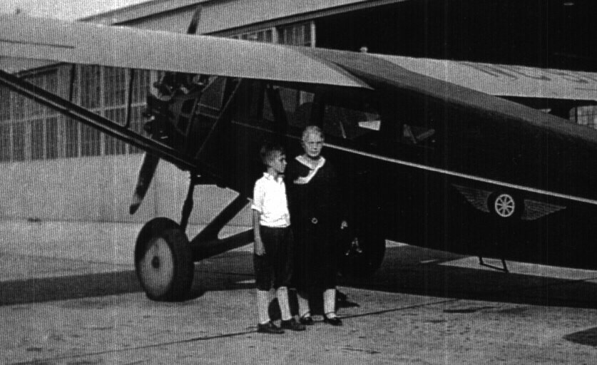 My great-grandmother Flora with nephew Ralph Reynolds at Wichita Municipal Airport