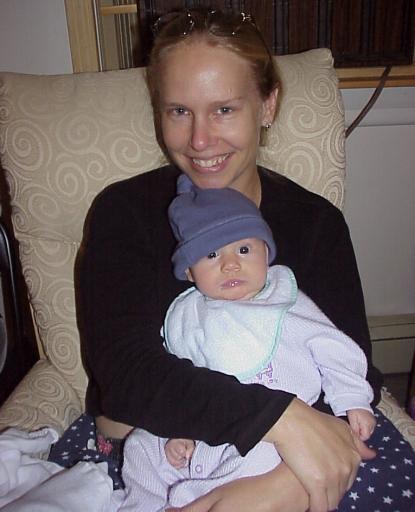 Mom and baby in the nursing throne.