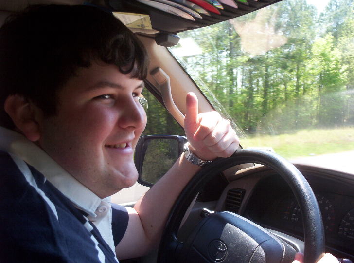 Brent, always with a positive attitude, heading to our show.....if only he could watch the road at the same time....
