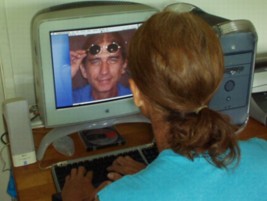 Photo of Mr. E in front of his computer