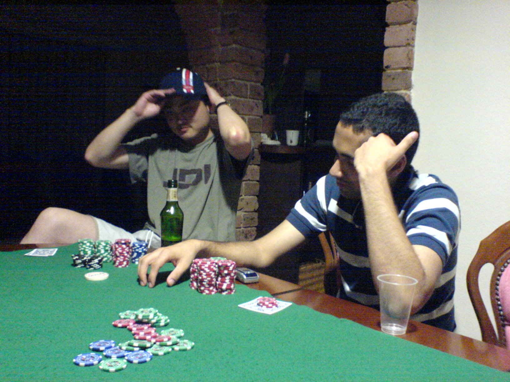 Ku with a sad poker face, Nik checks