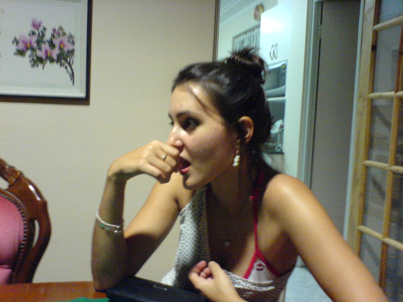 Suz pulling shirt down .. too hot?