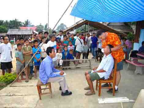 Tooth Aid  Paul Kotala, who has won a humanitarian of the year award, works on a patient in Laos.