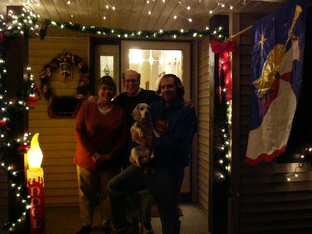 Kathy, Neil, Stoney, and Clark standing on the front porch.