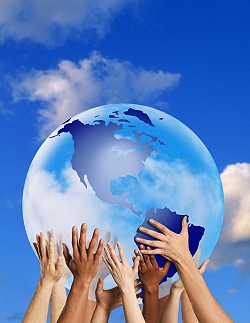 multiple hands holding world overhead