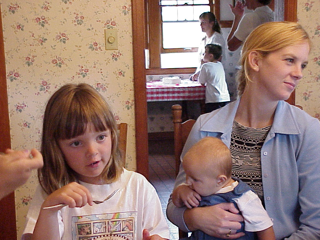 Charity with neice and nephew at Olivia's Birthday party.