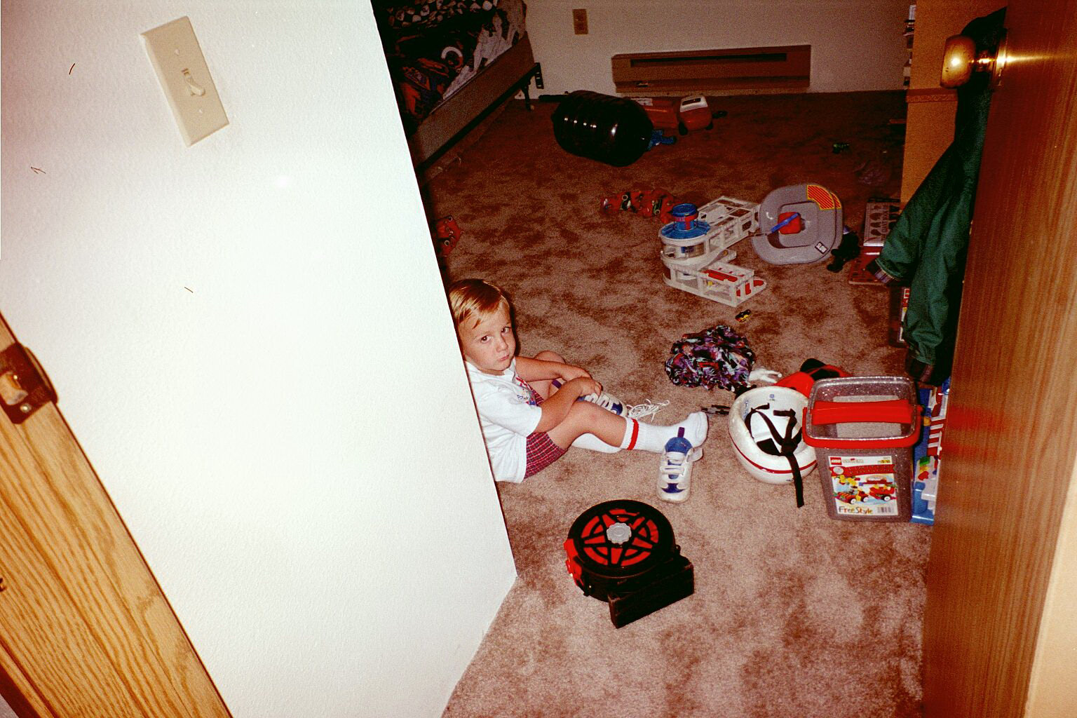 Taran putting his shoes on.