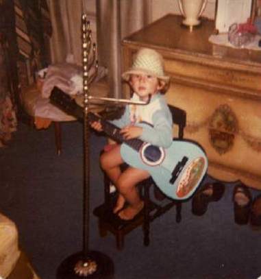 dh with plastic guitar, 1976