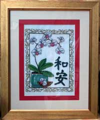 needle point picture of an orchid 