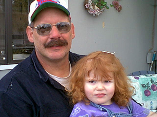 Grandpa Reicks and Lilly.&nbsp; April 2001