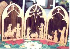 Triple Nativity with Walnut backplate