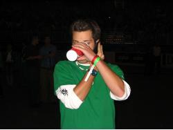 Dan's strange cellphone/drinking position.
