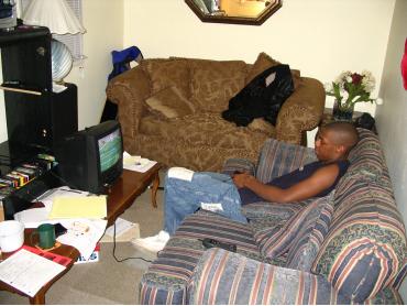 Jen's boyfriend playing Madden, like most guys