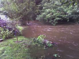 Minor flooding view upstream from swing set