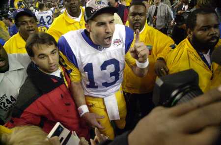 Kurt Warner mugs for the media