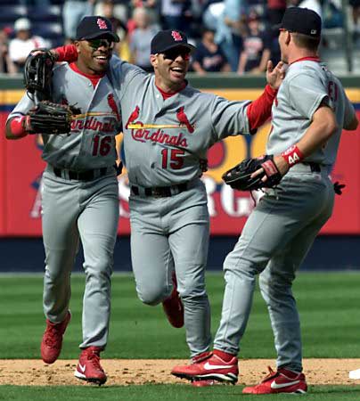 Lankford, Edmonds, and Drew all run to each other after the sweep