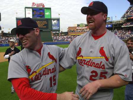 Edmonds and McGwire after the sweep in Atlanta