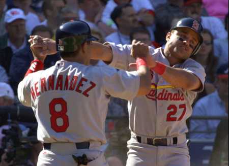 Hernandez and Polanco celebrate the sweep