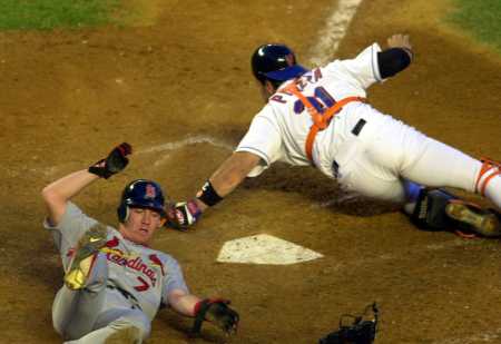 Drew slides home to score a run in the 3rd game win.