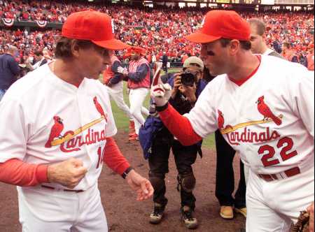 La Russa and Clark celebrate the game two win.