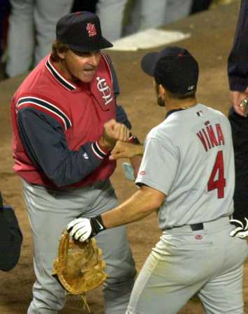 La Russa congratulates Vina.