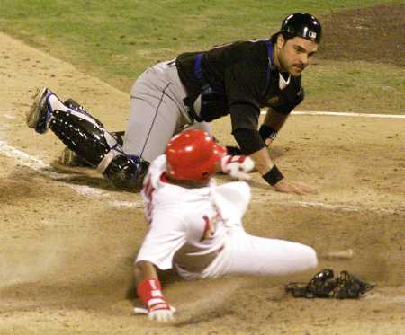 Lankford beats Piazza to score in the 1st game of the series.