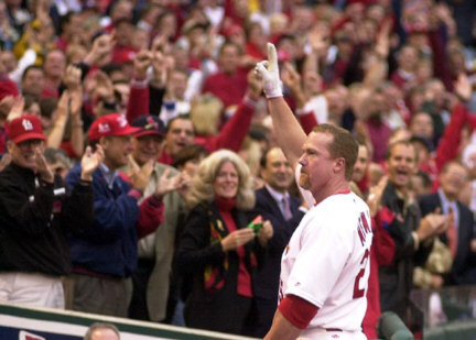 McGwire acknowledges the crowd after his game 2 homerun