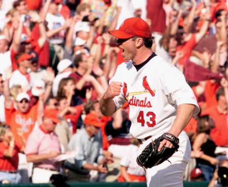 Veres celebrates with the St. Louis fans in the background.