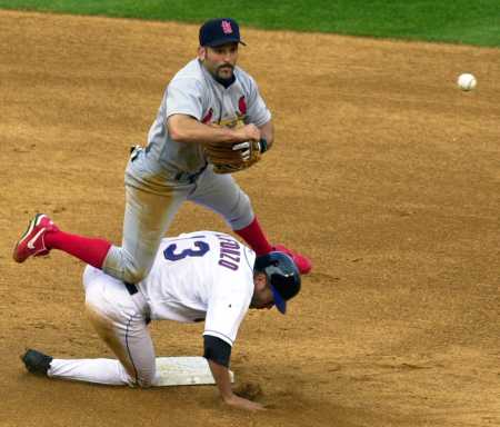 Vina catches the ball to make a double play.