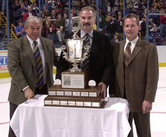 All three Blues coaches pose with the President's Trophy