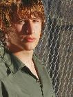 Brendan next to fence